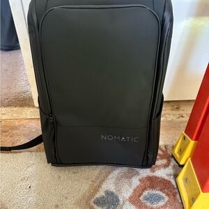Modern Black Backpack with Minimalist Design (Nomatic)